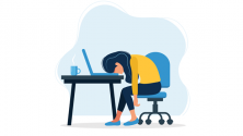 remote work fatigue - employee resting head on desk